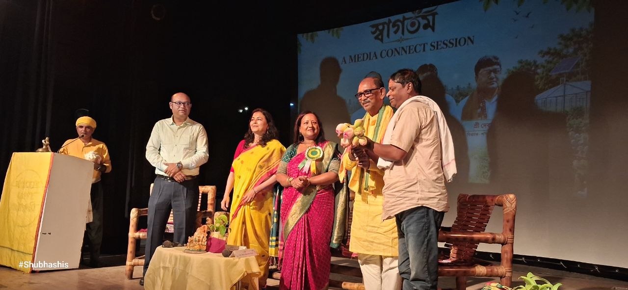 Shri Dudh Kumar Mondal, Hon'ble Minister of Agriculture, with flowers, Smt. Rinku Majumder Ghosh and Smt. Reena J. Sarkar