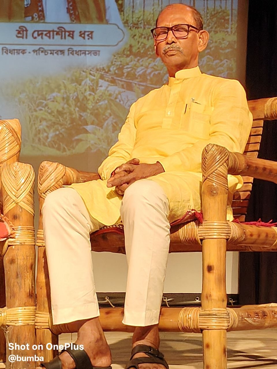 Minister Mondal seated