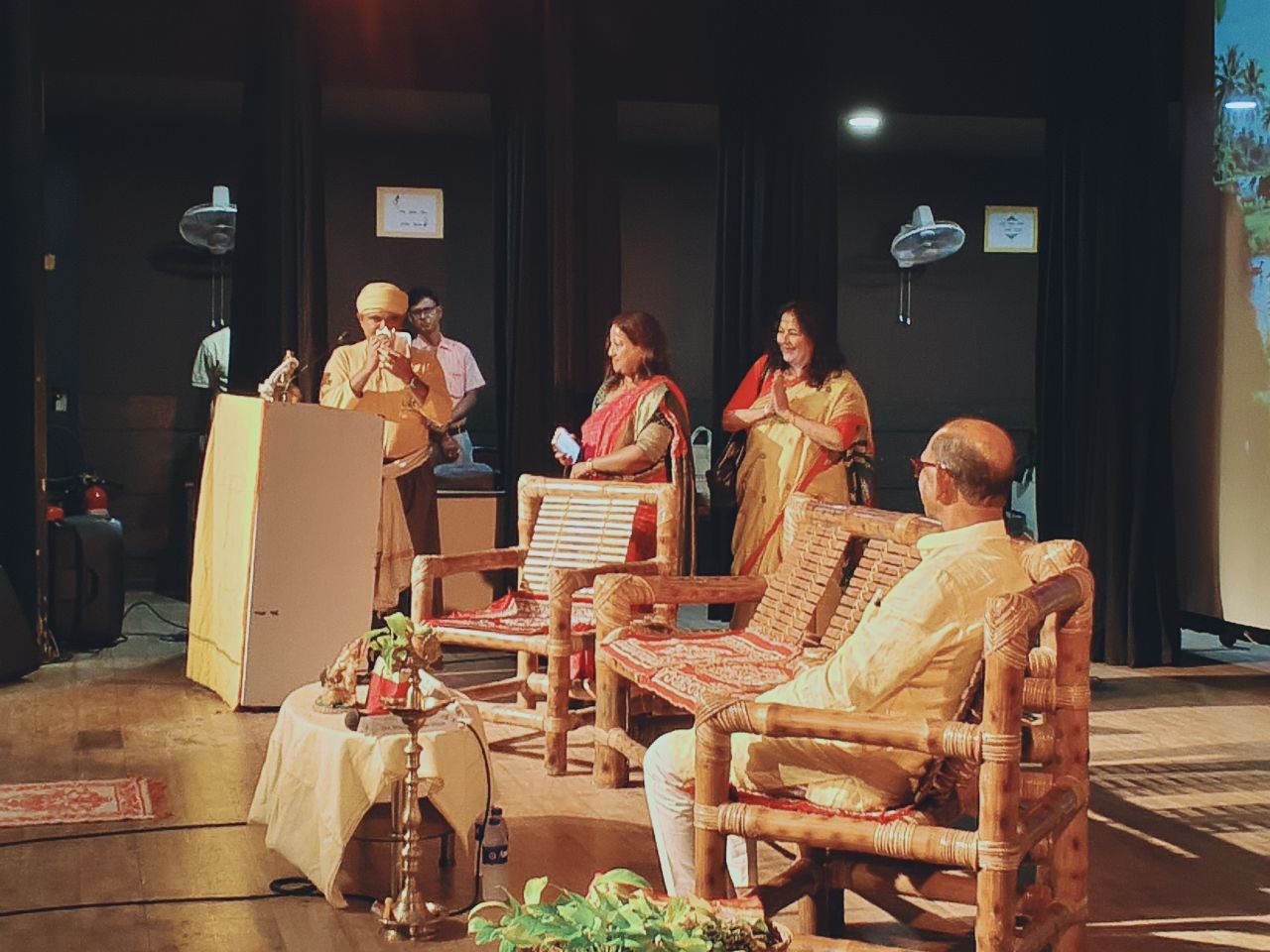 Opening namaste on stage