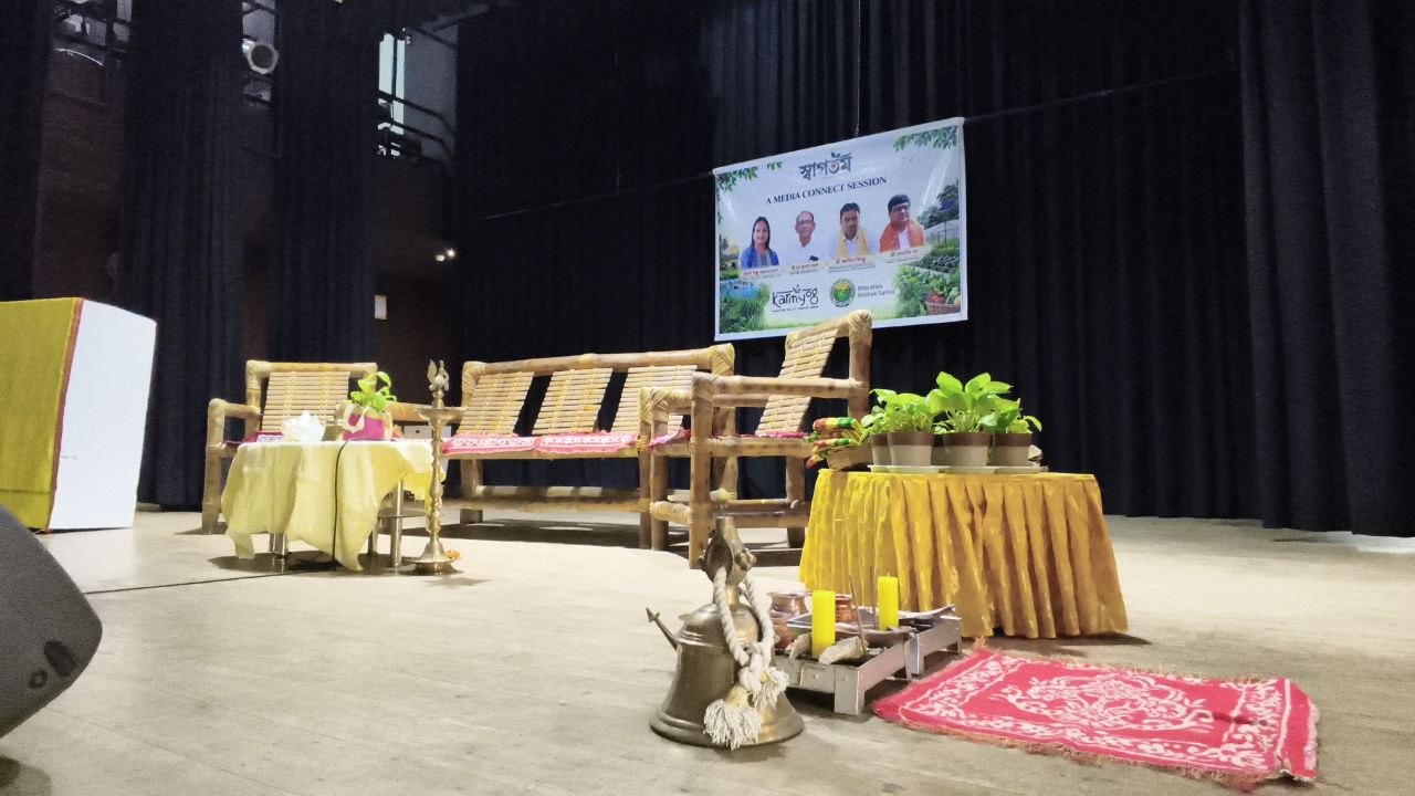 Bamboo stage set with puja and welcome banner